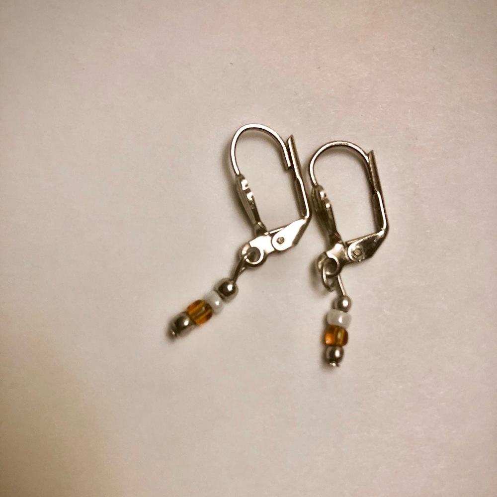 Vintage orange white silver lever back earrings with shell shape accent on front